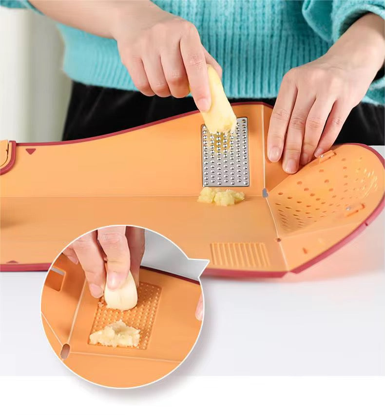CiLoN 6-in-1 Foldable Cutting Board with Colander, Grater & Grinder. Collapsible Chopping Board with Knife Sharpener & Knife, 100% BPA Free, Portable Camping & RV Kitchen Utensils. Orange